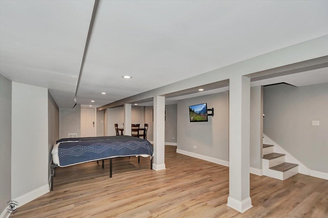 bedroom with light hardwood / wood-style floors