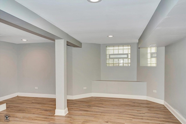 basement featuring light wood-type flooring