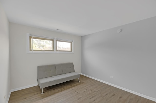 unfurnished room with light hardwood / wood-style floors