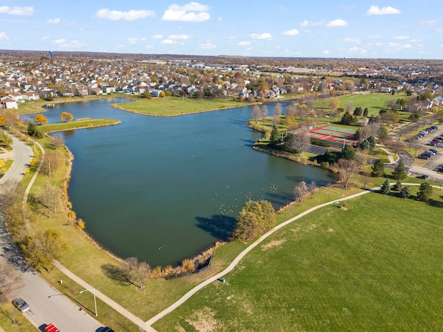 aerial view with a residential view and a water view