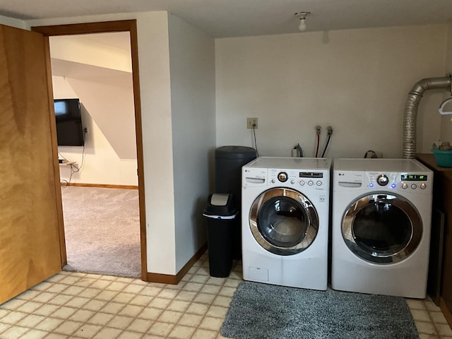 laundry area featuring light colored carpet and independent washer and dryer