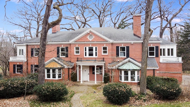 view of front of home with a balcony