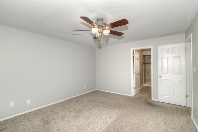 spare room with light colored carpet and ceiling fan