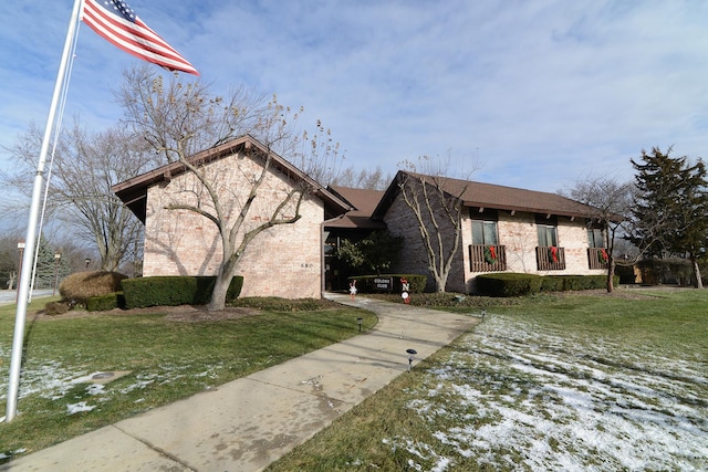 view of home's exterior featuring a lawn