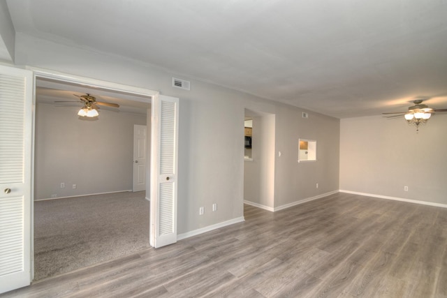 spare room featuring hardwood / wood-style flooring