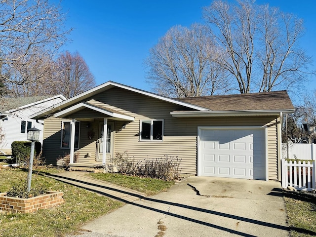 ranch-style house featuring a garage