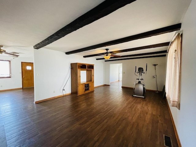 unfurnished living room with dark hardwood / wood-style floors, beam ceiling, and ceiling fan