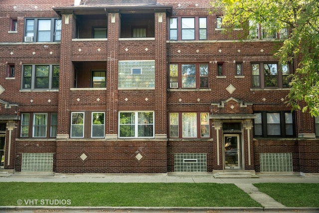 view of front of home with cooling unit