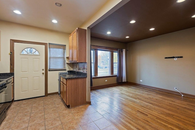 kitchen featuring plenty of natural light and light wood-type flooring