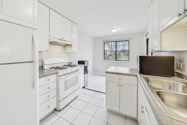 kitchen with white cabinetry, light tile patterned flooring, white appliances, and sink