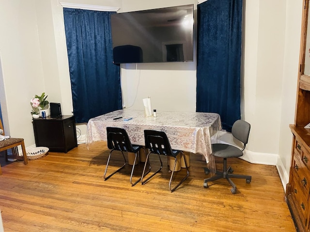 dining room featuring light hardwood / wood-style floors