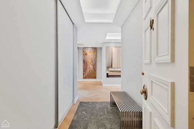 hallway with light parquet flooring