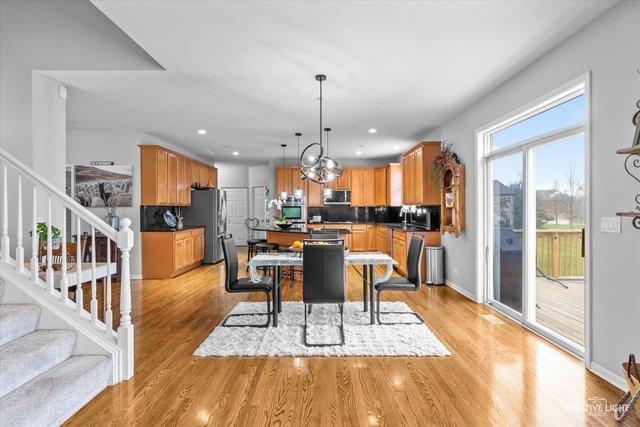 dining area with light wood-type flooring