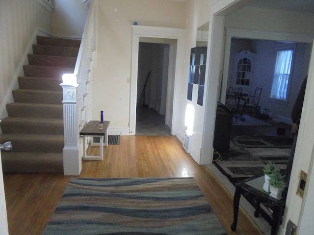 interior space with hardwood / wood-style flooring