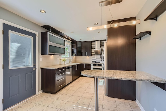 kitchen featuring open shelves, decorative backsplash, glass insert cabinets, a sink, and dishwasher