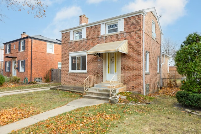 view of front of property with a front yard