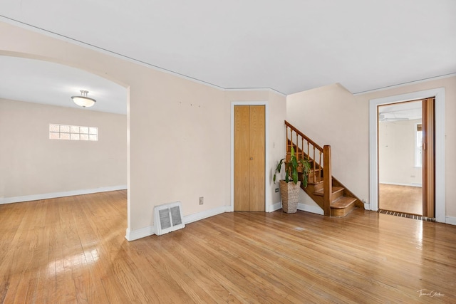 unfurnished room with light hardwood / wood-style floors