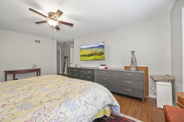 bedroom featuring light carpet and a closet