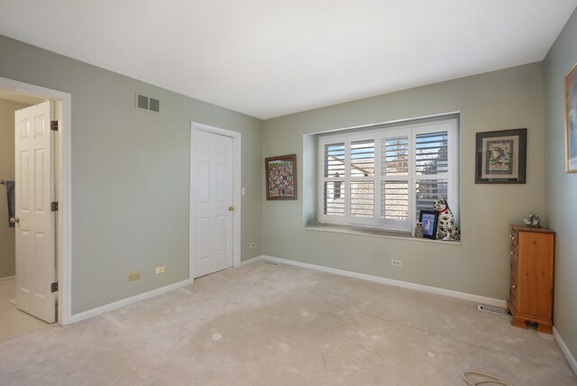 bathroom with walk in shower, tile patterned floors, vanity, and toilet