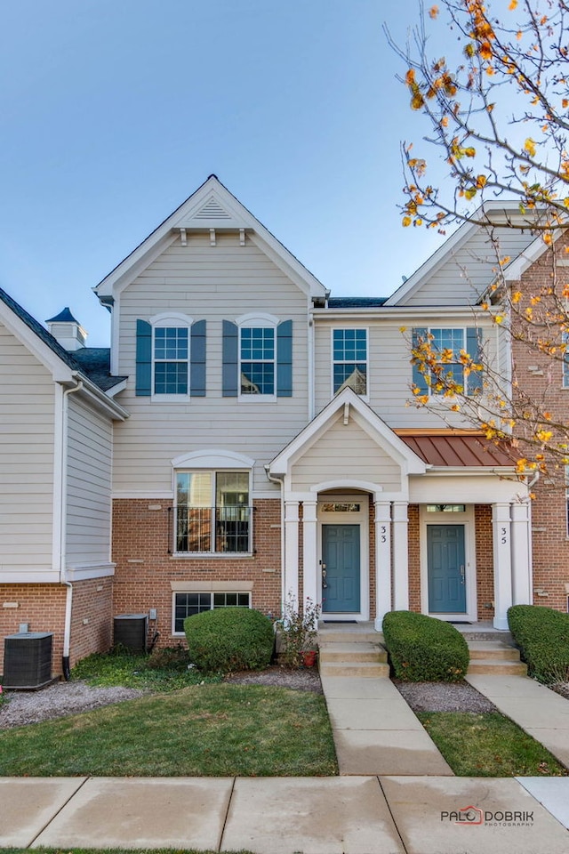 view of front of home with central AC