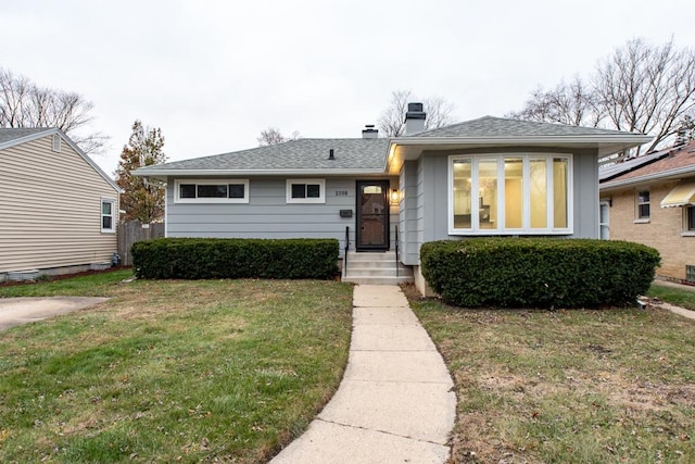 view of front of home with a front yard