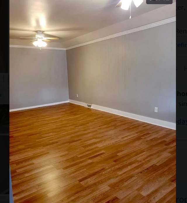 spare room featuring crown molding, hardwood / wood-style floors, and ceiling fan