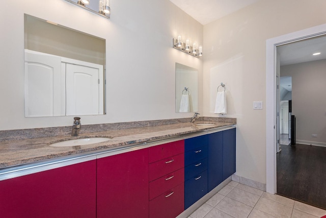 bathroom featuring vanity and hardwood / wood-style flooring