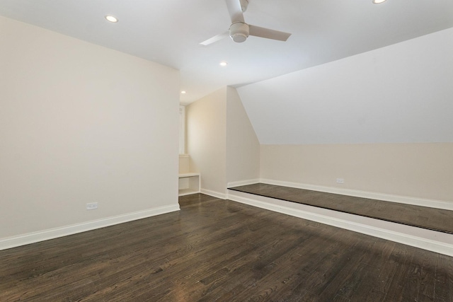 additional living space with lofted ceiling, ceiling fan, and dark hardwood / wood-style floors