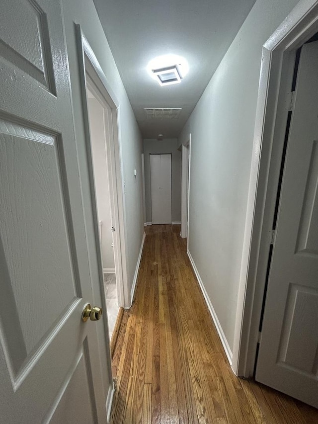 hall featuring hardwood / wood-style flooring