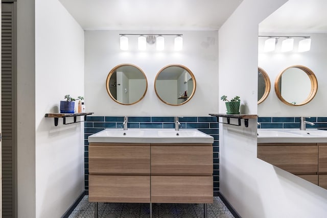 bathroom with vanity and track lighting