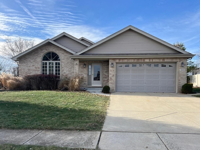 view of front facade with a garage and a front yard