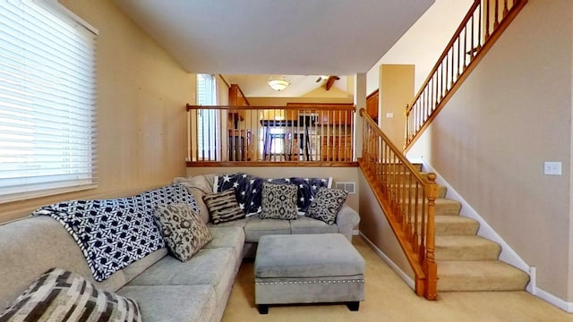 living room featuring light carpet