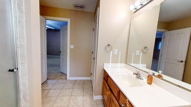 bathroom featuring tile patterned floors and vanity