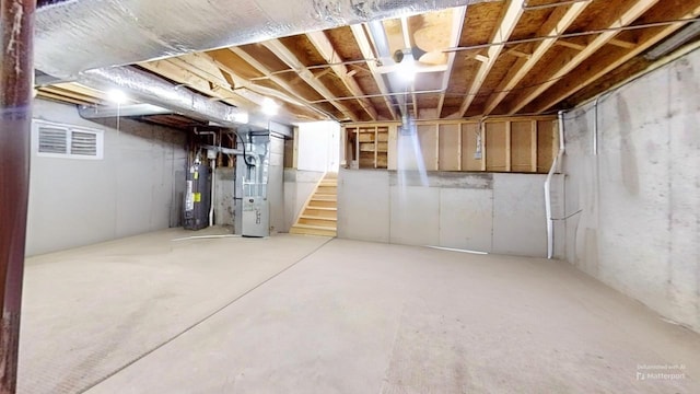 basement featuring gas water heater