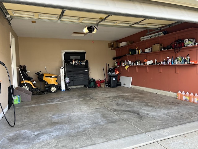 garage featuring a garage door opener