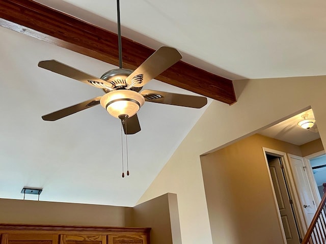 details featuring ceiling fan and beam ceiling