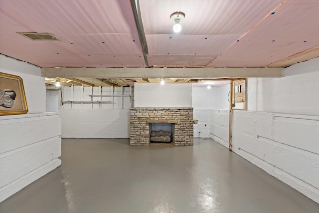 basement featuring a fireplace