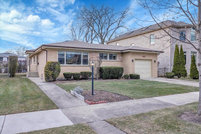 view of front of property with a front yard and a garage