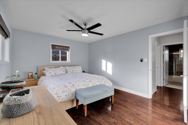 bedroom with ceiling fan and dark wood-type flooring