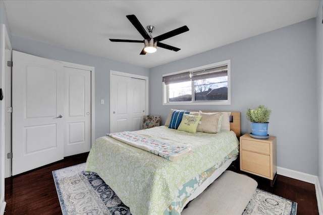 bedroom featuring a closet, dark hardwood / wood-style floors, and ceiling fan