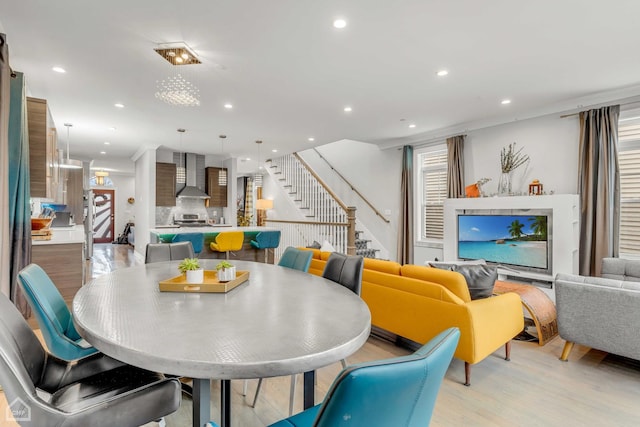 dining space featuring light hardwood / wood-style floors