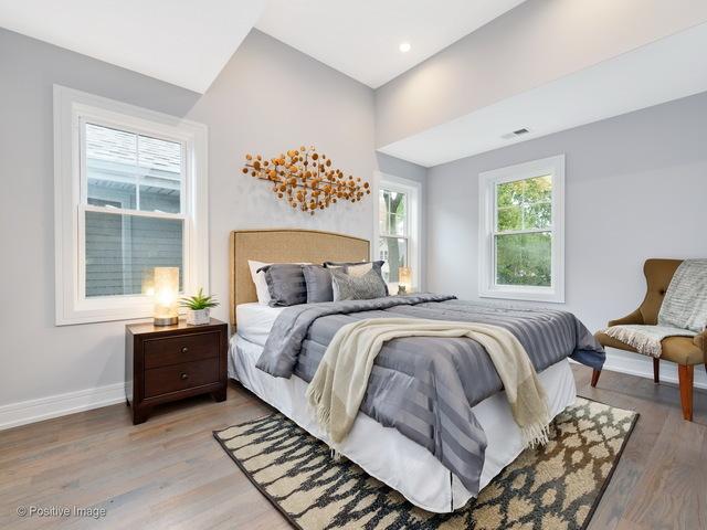 bedroom featuring hardwood / wood-style floors