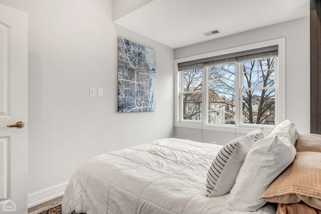 bedroom featuring light wood-type flooring