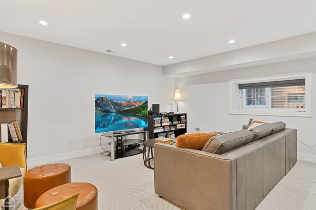 living room featuring light carpet