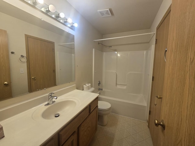 full bathroom featuring vanity, toilet, and bathing tub / shower combination