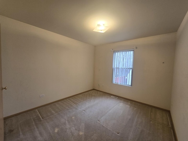 spare room with carpet flooring