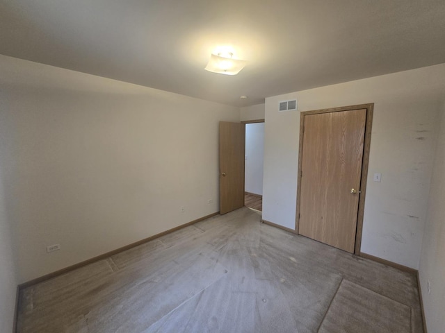 unfurnished bedroom featuring a closet