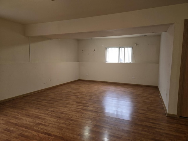 empty room featuring dark hardwood / wood-style floors