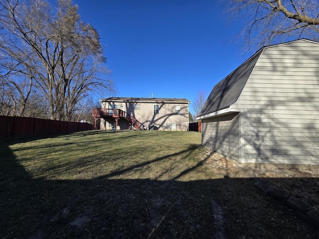 view of yard featuring a wooden deck