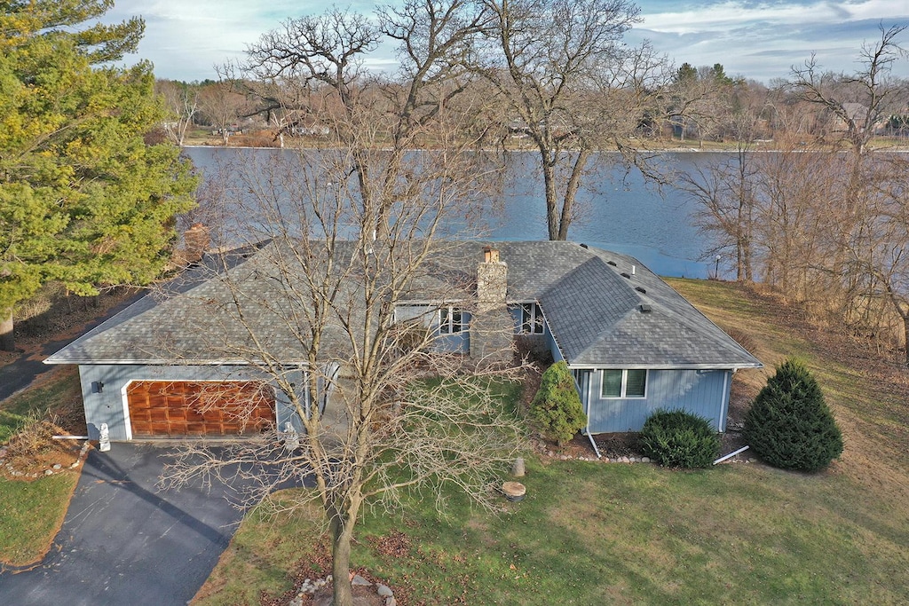 drone / aerial view with a water view